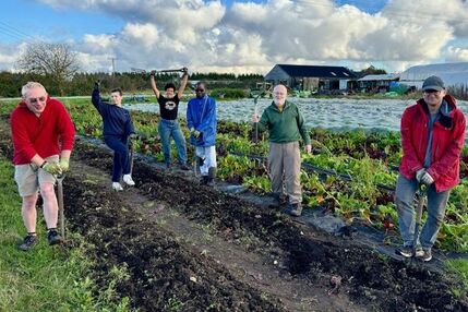 January 2025- Volunteer Stories of the month group celebrating together