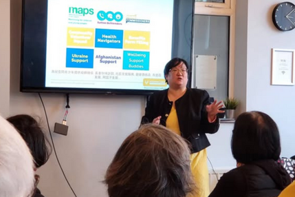 Asian lady giving a presentation