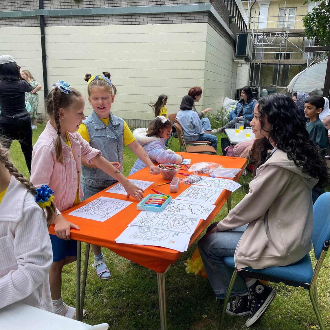 Young Commissioners Refugee Picnic colouring in