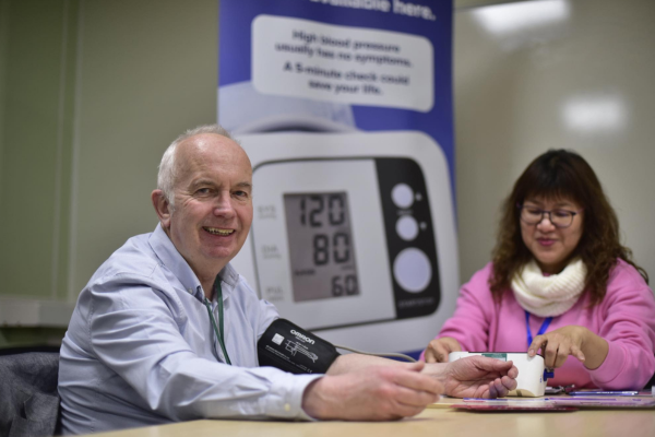 Health Navigators Take Councillor Barry Lewis's Blood Pressure