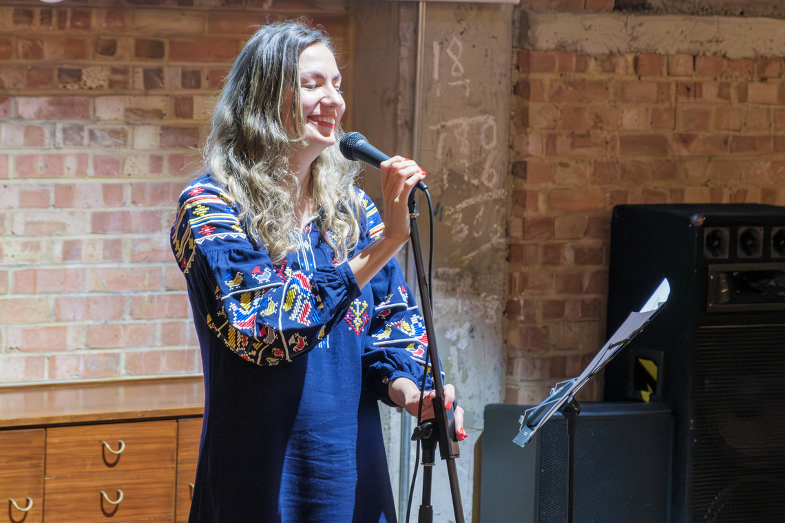 Yana performing a heartfelt song 