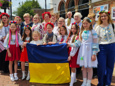 Ukrainian women, children and man in traditional dress 