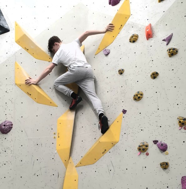 Ukrainian young person MAPS Mentoring climbing wall
